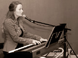 UK wedding singer Laura as she sings at the piano
